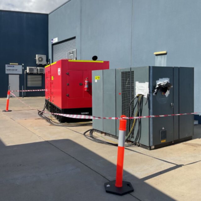 Industrial compressor, being tested for service and maintenance at Nessco Pressure System's Welshpool workshop.